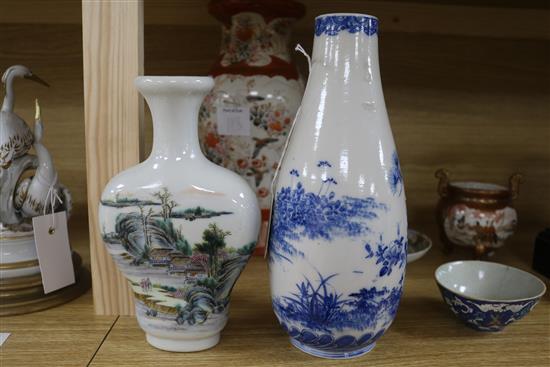 A collection of Asian ceramics, including a Chinese white ground flattened pyriform vase